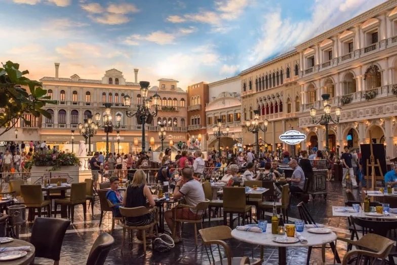 Indoor dining area with a sky-painted ceiling at The Venetian in Las Vegas